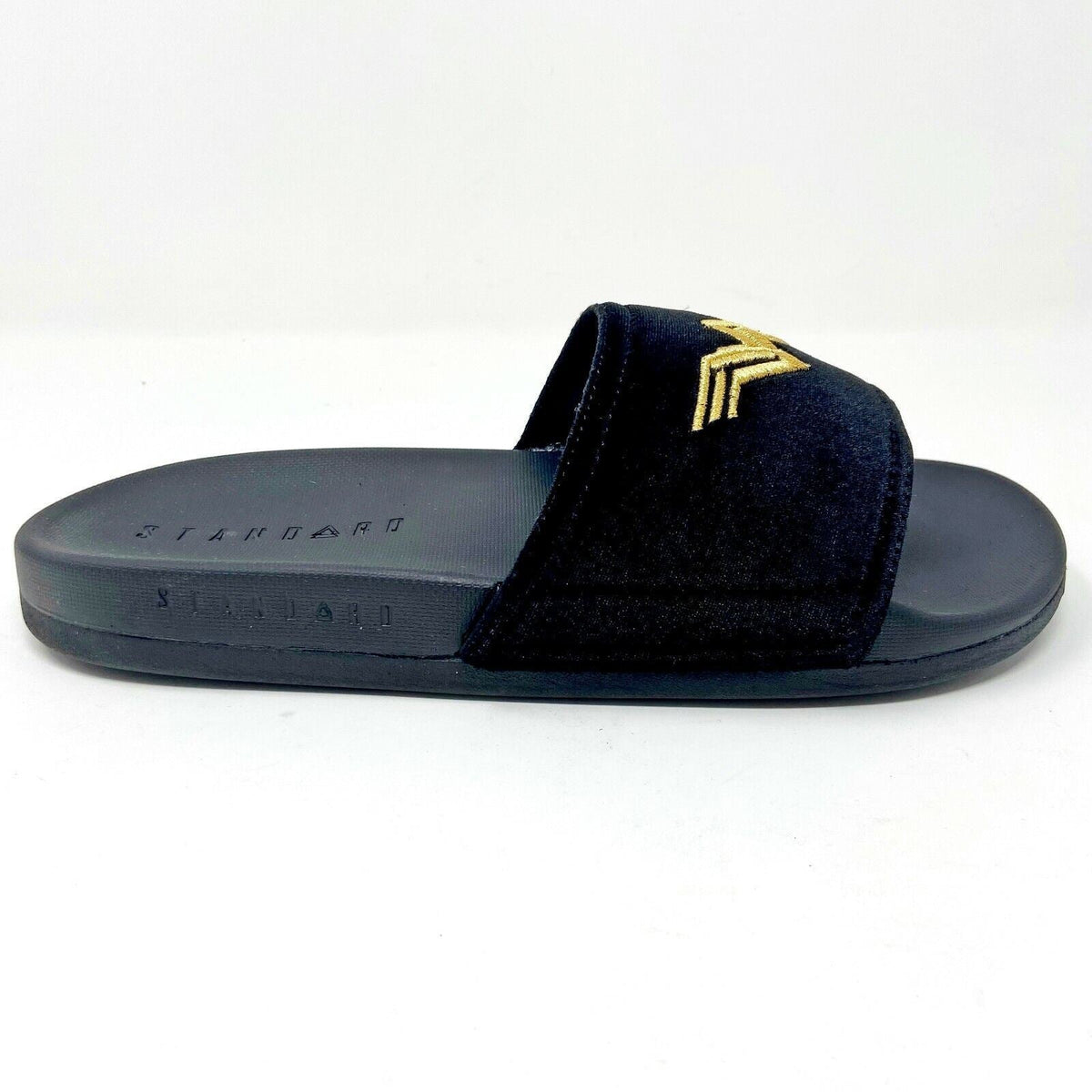 STNDRD Standard Monaco DC Comics Wonder Woman Black Gold Womens Slides Sandals