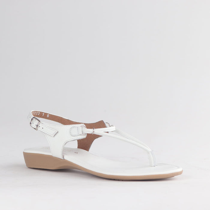 Froggie Women’s Spaghetti Thong Sandal 13075 in white leather featuring slim straps, cushioned sole, and lightweight summer comfort design.
