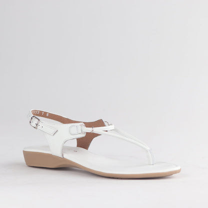 Froggie Women’s Spaghetti Thong Sandal 13075 in white leather featuring slim straps, cushioned sole, and lightweight summer comfort design.