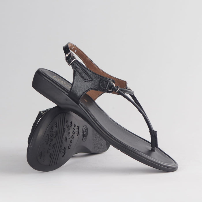 Black leather Froggie 13075 women’s thong sandal featuring delicate spaghetti straps, soft insole and minimalist warm-weather style.
