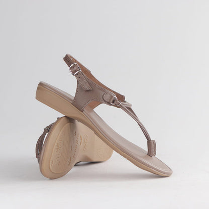 Stone leather style -13075 women’s thong sandal by Froggie with delicate spaghetti strap detailing, slip-on fit and minimalist warm-weather style.